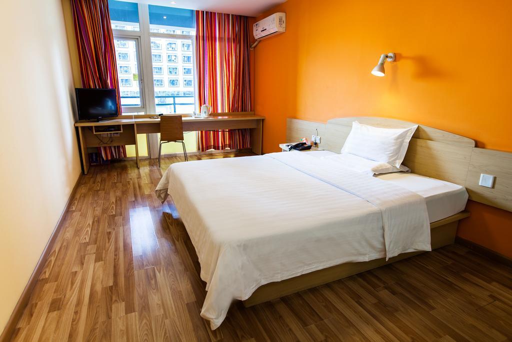 7Days Inn Premium Beijing Chaoyangmen Pequim Quarto foto